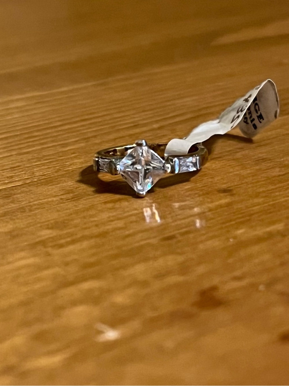 Cubic Zirconia princess cut on a gold tone 14K HGE band size 4